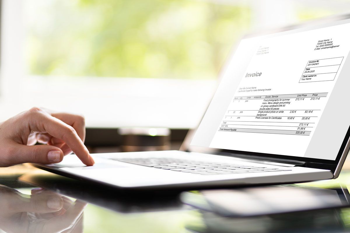 Laptop with Invoice onscreen